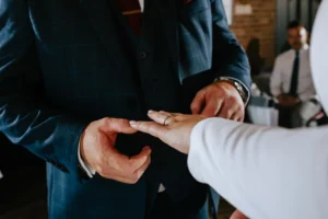 Exchange of rings during ceremony at the Betsey Wynne