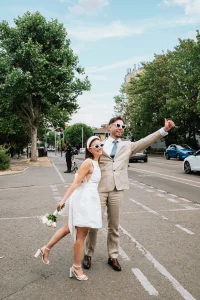 Love and laughter Waltham Forest Town Hall wedding photographer capturing couple outside the registry office