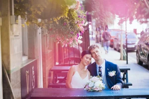 Editorial portrait of the newlyweds on Bidborough Street near Camden Town Hall.