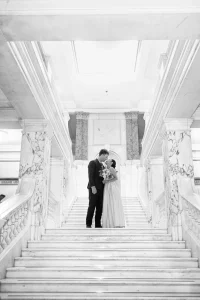 Fashion- black and white inspired wedding portrait on the marble staircase at Camden Town Hall.