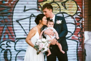 British-Asian couple portrait on Bidborough Street around Camden Town Hall.