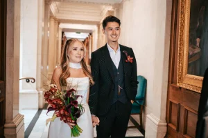 Editorial couple arriving for their wedding at Old Marylebone Town Hall in London.